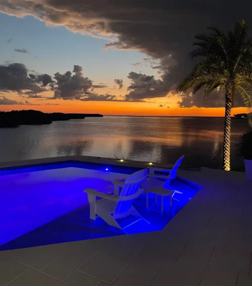 Geometric pool with sun shelf and LED light features