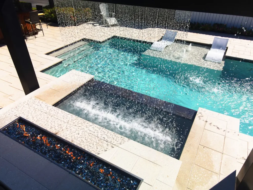 Close-up of fire and water features from a custom pool builder