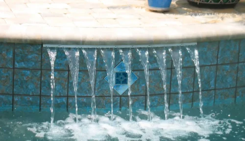 Close-up of water feature for custom built pool