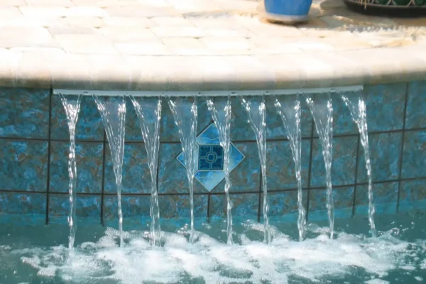Close-up of water feature for custom built pool
