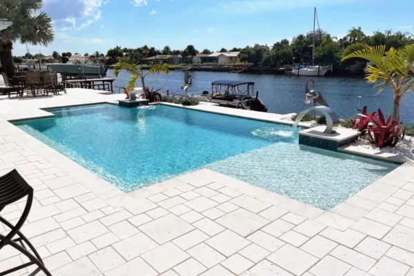 Geometric Pool with sun shelf and water features.