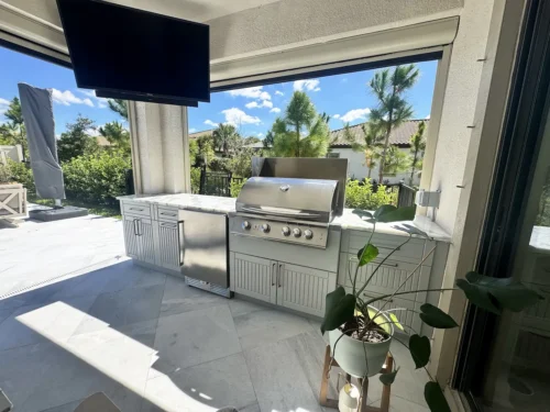 Outdoor kitchen for poolside entertaining.