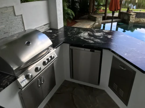 Outdoor kitchen near pool