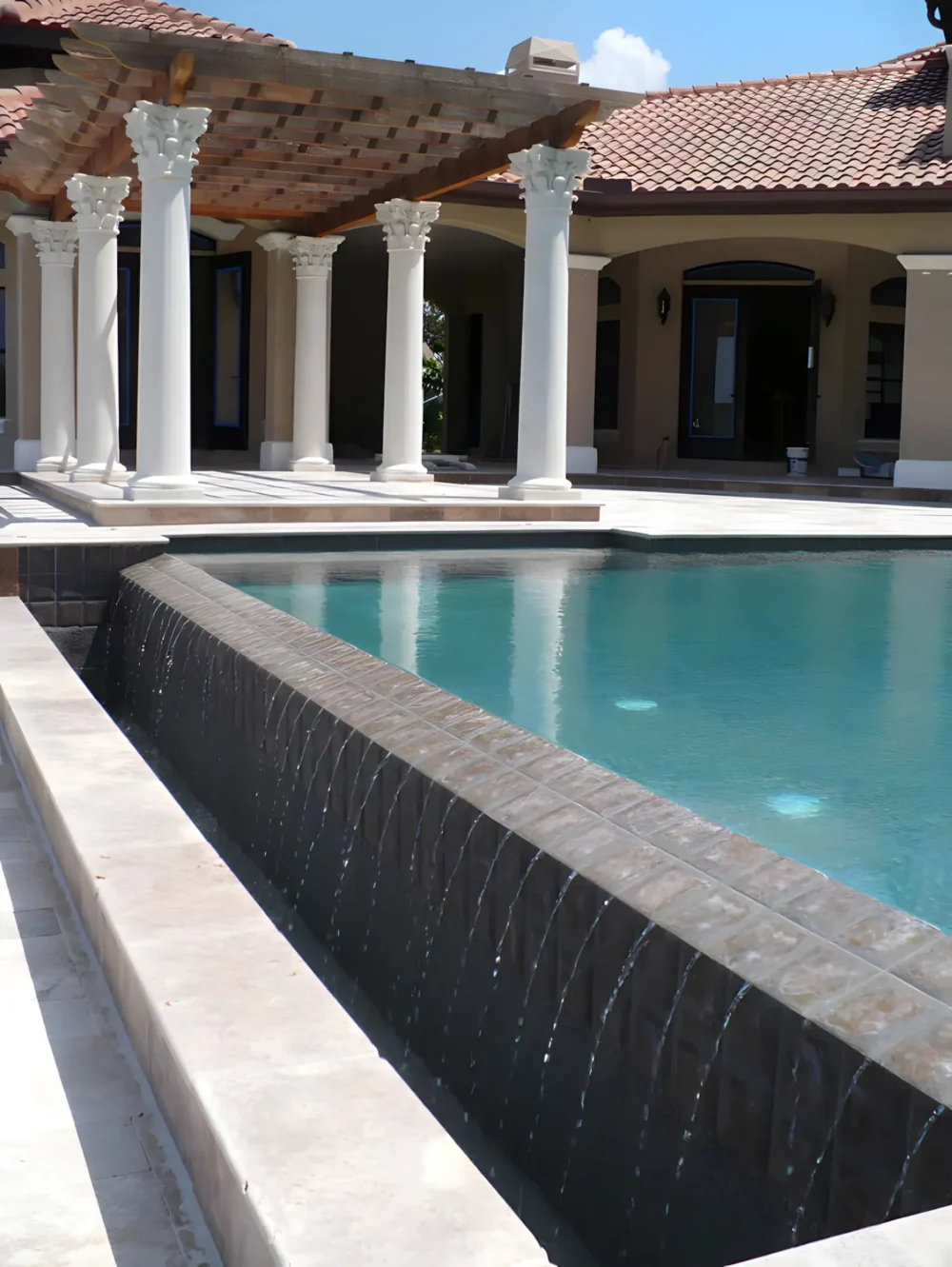 Stunning water feature for custom built geometric pool