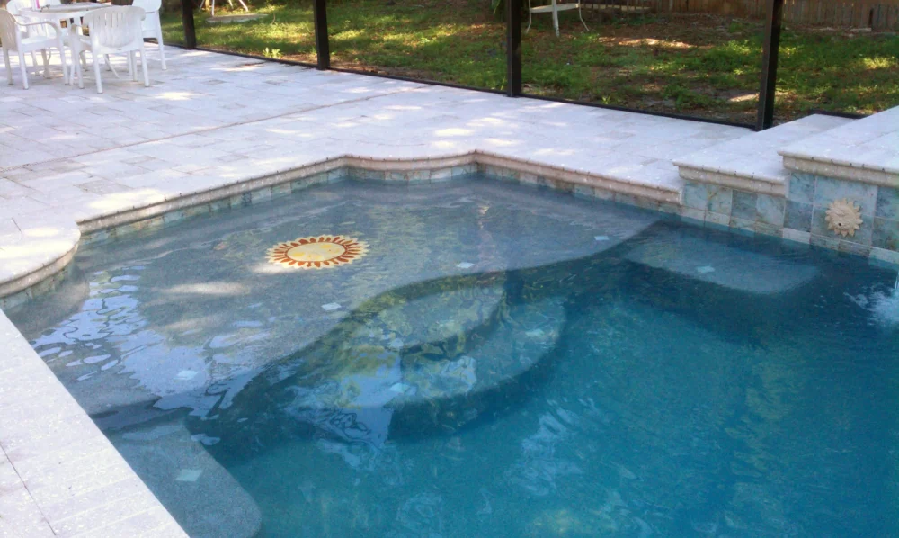 sun shelf added by a custom pool builder